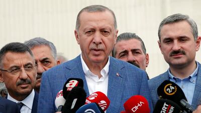 Turkish President Tayyip Erdogan talks to media after the Eid Al Fitr prayers in Istanbul. Reuters