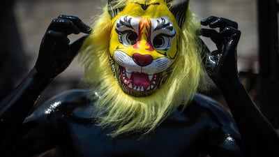 Young residents of San Nicolas de los Ranchos community, Puebla state, Mexico, paint their bodies with oil and dance in the town's traditional carnival. AFP