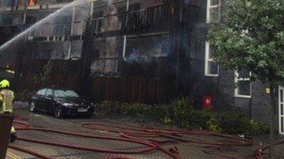 Around 100 firefighters tackled the blaze which has destroyed 20 flats. London Fire Brigade