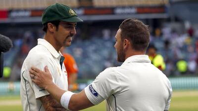 New Zealand captain Brendon McCullum, right, paid tribute to Australia paceman Mitchell Johnson, left, after the latter retired at the end of the drawn Perth Test. David Gray / Reuters