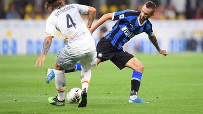 Inter Milan's Marcelo Brozovic in action with Lecce's Jacopo Petriccione. Reuters