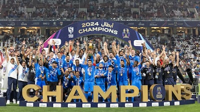 Al Hilal players celebrate their Saudi Super Cup victory over Al Ittihad in Abu Dhabi. Goals from Brazilian forward Malcolm (2), Salem Al Dawsari and namesake Nasser Al Dawsari sealed a 4-1 victory at the Mohamed bin Zayed Stadium in Abu Dhabi as Hilal claimed the trophy and extended their world record run of wins to 34 matches. AFP