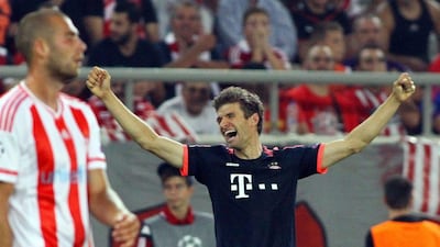 Bayern Munich's Thomas Muller celebrates after scoring the opener in his side's 3-0 Champions League win over Olympiakos on Wednesday night in Greece. Spyros Chorchoubas / EPA / September 16, 2015