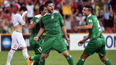 Iraq's Yaser Kasim celebrates after scoring the winning goal against Jordan in a 1-0 win at the Asian Cup on Monday in Brisbane, Australia. Saeed Khan / AFP / January 12, 2015