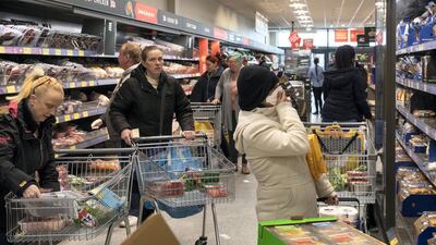 Shoppers in an Aldi supermarket on March 23 in London. Getty Images