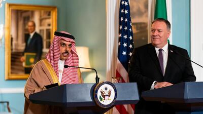 Secretary of State Mike Pompeo, right, listens to Saudi Minister of Foreign Affairs Prince Faisal bin Farhan Al Saud speak during their meeting at the State Department. AP Photo