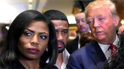 Omarosa Manigault-Newman, left, appears alongside Donald Trump during his US presidential campaign, at a press conference in 2015. AFP
