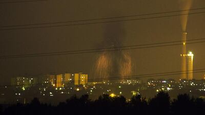 Smoke rises after an Israeli air strike in the northern Gaza Strip, as seen from the Israeli side of the border on Tuesday. Amir Cohen / Reuters