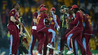 West Indies dance in celebration after winning the ICC World Twenty20 2012 semi-final against Australia in Colombo, Sri Lanka. (Photo by Gareth Copley/Getty Images)