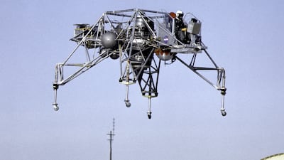 A lunar landing research vehicle in flight over California in 1964. The untethered simulator was used to profile the descent to the Moon's surface