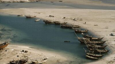 Dhows moored at what is now the marina near the Intercontinental Hotel in Abu Dhabi. 1975.