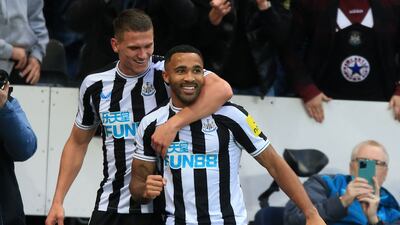 Newcastle striker Callum Wilson celebrates with defender Sven Botman after scoring the second goal. AFP