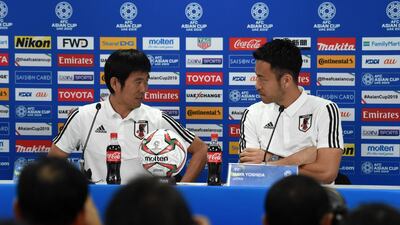 Japan's player Maya Yoshida, right, with head coach Hajime Moriyasu, left, attend the pre-match press conference ahead of the AFC Asian Cup final match against Qatar at the Zayed Sports City Stadium in Abu Dhabi. AFP