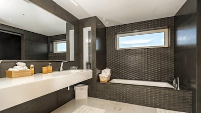 The bathrooms have that five-star hotel look