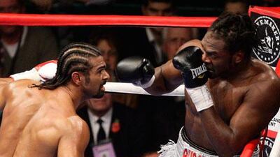 Audley Harrison covers up to avoid David Haye during their fight in 2010