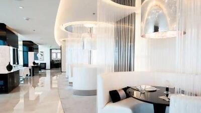 The sumptuous, monochrome interior of the Prime 68 steakhouse. Charles Crowell for The National