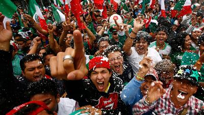 Fans of Mexico's soccer team celebrate after their team beat Brazil in the men's soccer final at the London 2012 Summer Olympics, below the Angel of Independence monument in Mexico City. Marco Ugarte/AP Photo