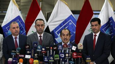 The head of Iraq's Independent Higher Election Commission (IHEC), speaks during a press conference, in the presence of the nine members of the IHEC, on May 31. Ahmad Al Rubaye / AFP