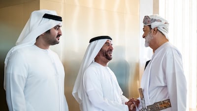 Sheikh Suroor bin Mohamed greets Sultan Haitham. Abdulla Al Neyadi / UAE Presidential Court