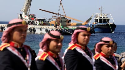 Members of the Jordan Armed Forces watch the scuttlings.