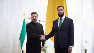 Ukraine's President Volodymyr Zelenskyy, left, met Syria's President Ahmad Al Shara in Damascus. Reuters