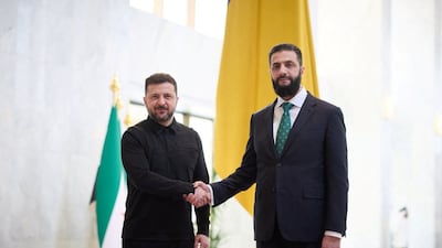 Ukraine's President Volodymyr Zelenskyy, left, met Syria's President Ahmad Al Shara in Damascus. Reuters