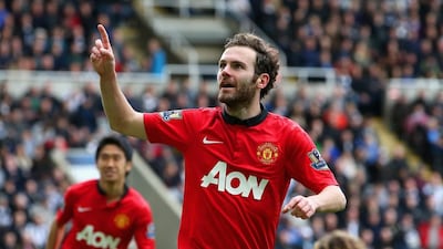 Juan Mata of Manchester United celebrates scoring their second goal during the Premier League match between Newcastle United and Manchester United at St James’ Park on April 5, 2014 in Newcastle upon Tyne, England. Jan Kruger / Getty Images