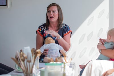 Louise Atkinson, founder of Dou La La in Dubai, teaches parents the right techniques to perform an infant massage themselves