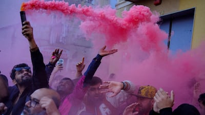 Members of the Bangladeshi community celebrate in Barcelona. Reuters