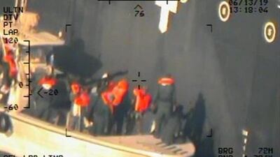 The US defence department released further pictures of Iranian forces near one of the oil tankers. In this frame, members of Iran's Revolutionary Guard navy remove an unexploded limpet mine from the M/T Kokuka Courageous. All photos by US Navy / Reuters