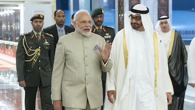 Sheikh Mohammed bin Zayed, Crown Prince of Abu Dhabi Deputy Supreme Commander of the UAE Armed Forces (R), receives Narendra Modi Prime Minister of India (L), at the Presidential Airport. Rashed Al Mansoori / Crown Prince Court - Abu Dhabi