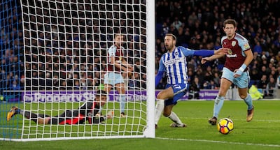 Brighton's Glenn Murray, centre, misses a chance to score against Burnley. Paul Childs / Reuters