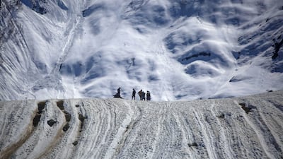 Tourists enjoy the snow-covered slopes of Sonamarg about 80km from Srinagar, the summer capital of Indian Kashmir. EPA