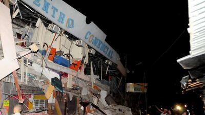 As rescue workers rushed in, officials said Sunday at least 77 people were killed, over 570 injured and the damage stretched for hundreds of miles to the capital and other major cities. Ariel Ochoa / AFP Photo