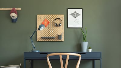 Dubai-based interior designer Kathryn Hawkes recently created a study corner for her son using complementary dark colours and wooden furniture. Marli Smith
