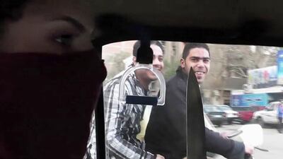 One moment sees director Samaher Alqadi hold up a kitchen knife when she’s in a taxi. Courtesy Samaher Alqadi