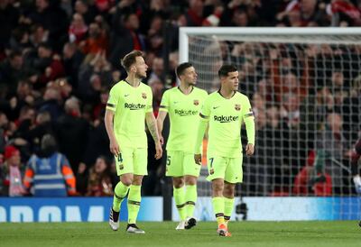 Barcelona's Ivan Rakitic, Clement Lenglet and Philippe Coutinho look despondent after conceding their third goal. Reuters