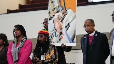 Family members and supporters hold a photograph of Tyre Nichols in Memphis, Tennessee, on January 23. AP
