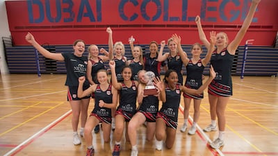 Dubai College players celebrate with the trophy after winning Open Youth netball tournament that took place during the Emirates Dubai Sevens. All images by Ruel Pableo for The National