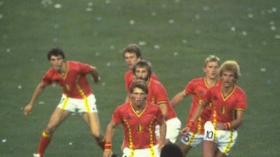 Diego Maradona of Argentina is confronted by a posse of Belgium defenders during 1982 Wold Cup in Spain. Allsport