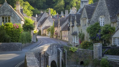 Castle Combe is one of many villages in the area characterised by the widespread use of golden Cotswold stone in construction. Getty Images