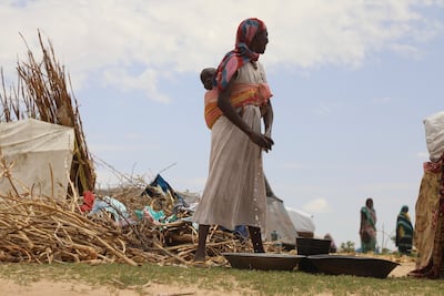 Sudanese refugees who fled the violence in Darfur gather at the Zabout refugee camp in Goz Beida, Chad. AP