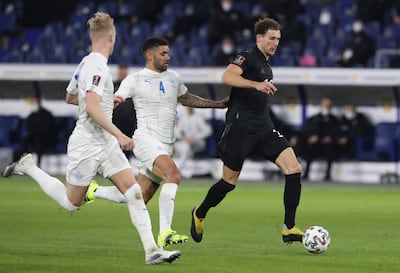 Germany's Leon Goretzka, right, and Iceland players challenge for the ball. AP