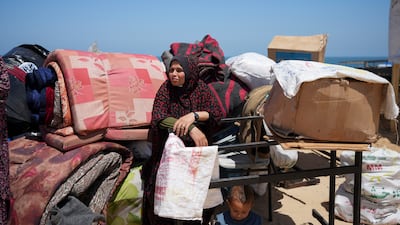 Displaced Palestinians arrive in central Gaza after fleeing from the southern Gaza city of Rafah, on May 9. AP