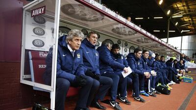 Manchester City coach Manuel Pellegrini, left, has watched as his club has dropped their past three meetings with Barcelona. Carl Recine / Reuters