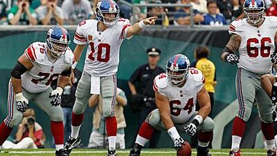 The Giants’ Eli Manning, No 10, has achieved the league’s fifth-highest passer rating.