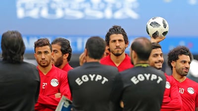 Egypt's Mohamed Salah, right, and his teammates attend a training session in Saint Petersburg. Tolga Bozoglu / EPA