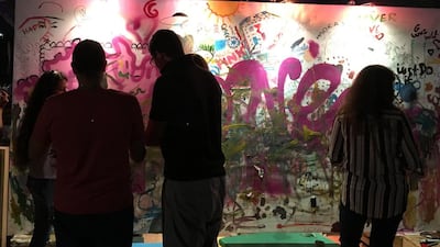 Blank Canvas set up a community art wall which inspired people’s creativity. Tributes to Prince, who died on Thursday, and images and slogans for Earth Day took precedence. Photo by Amanda Dale