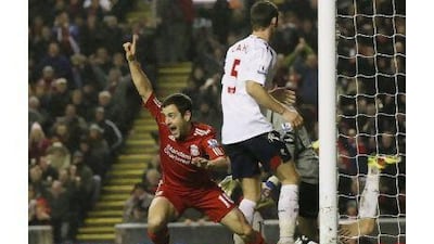 Joe Cole, above clebrating his goal against Bolton, says Roy Hodgson, the Liverpool coach, still has the full support of his players despite their poor season.