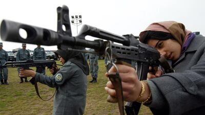 Afghan police officers receive training in Herat on March 2, 2010. EPA